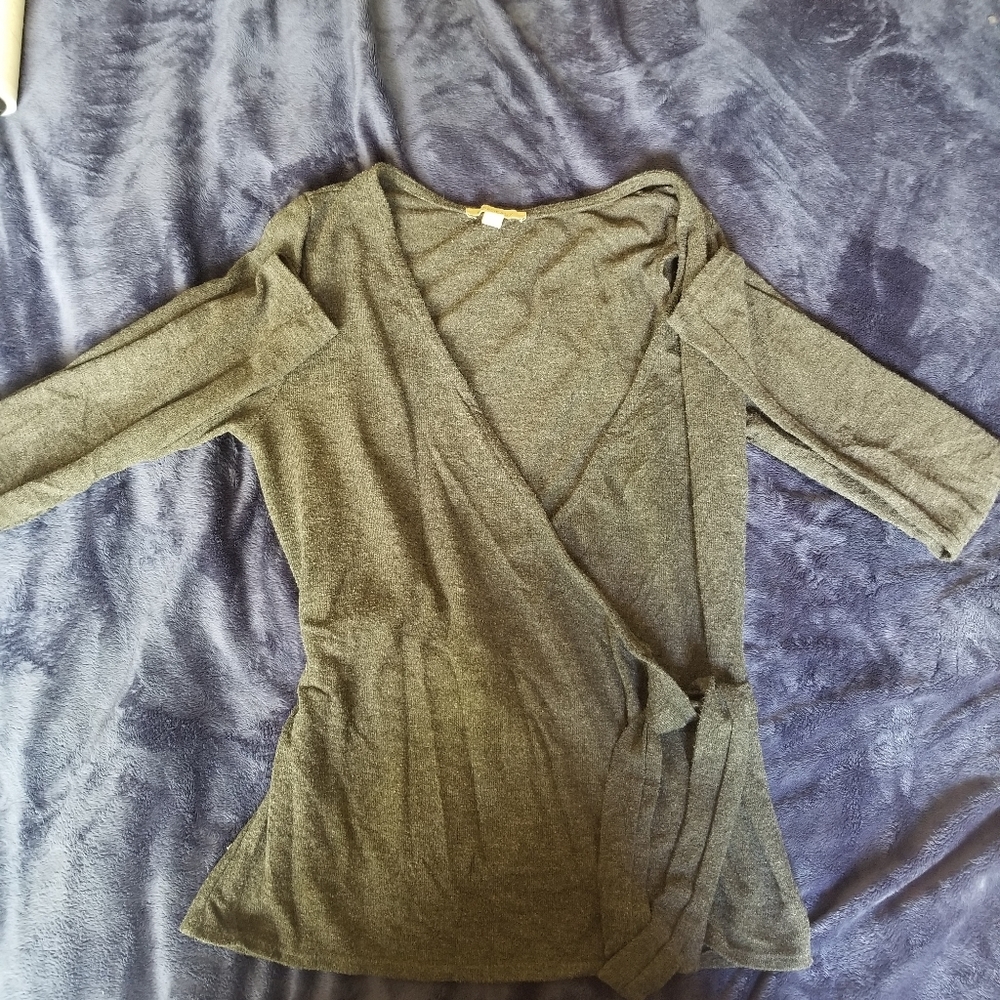 Grey sweater wrap top with 3/4 sleeve.